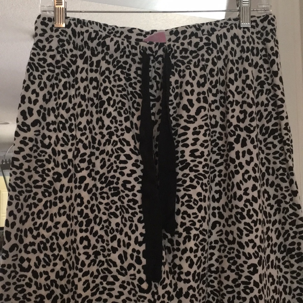 Leopard print pajama bottoms.  XL or L